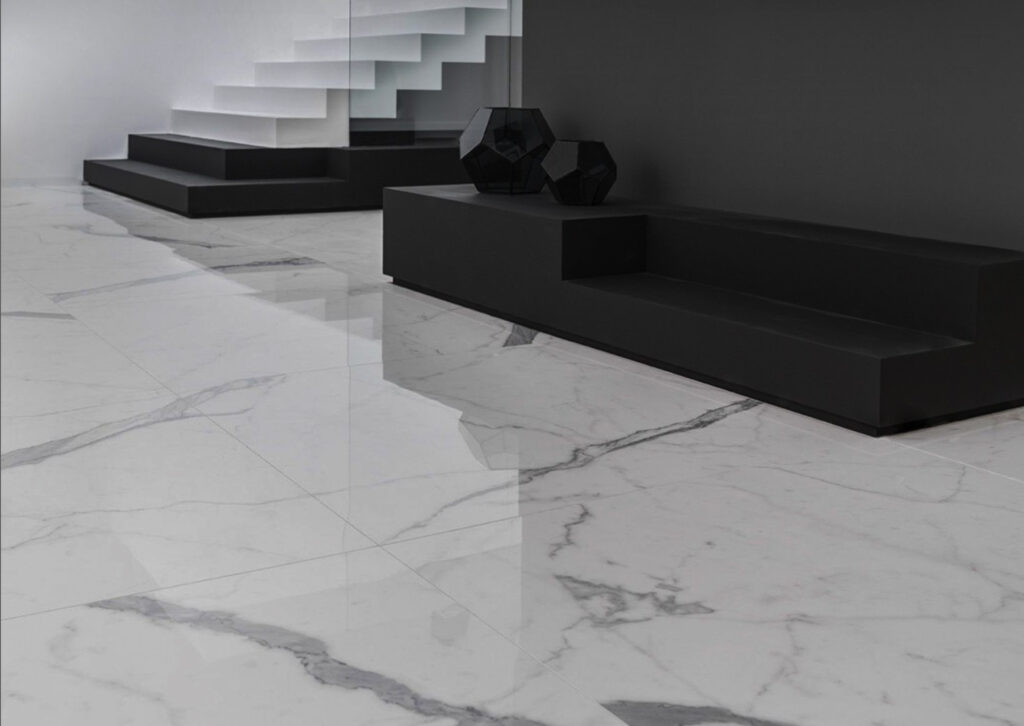 Room with marble-effect lapped porcelain stoneware flooring, black and white furnishings