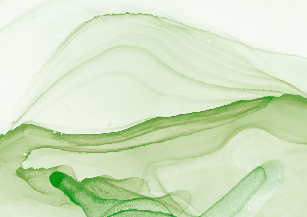 green ink on a white background